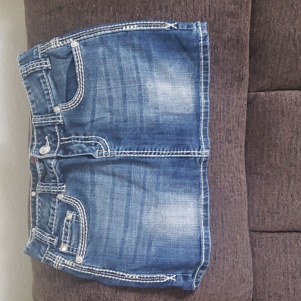 Rock and roll cowgirl  denim skirt.